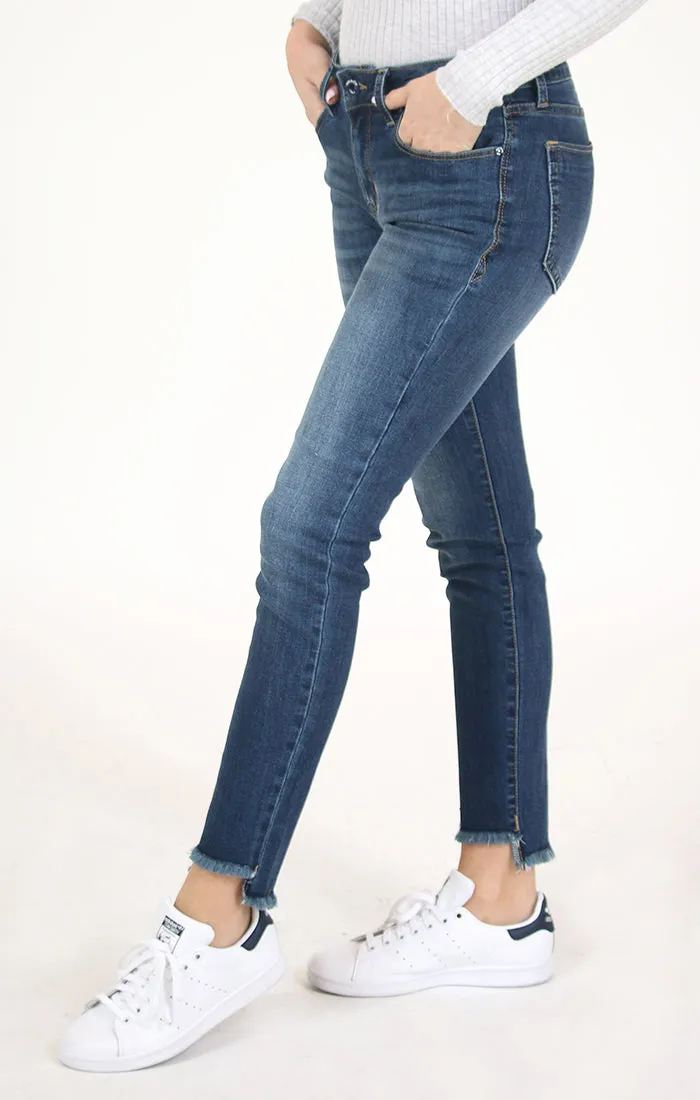 Medium Wash Frayed Hem Mid Rise Skinny Jeans