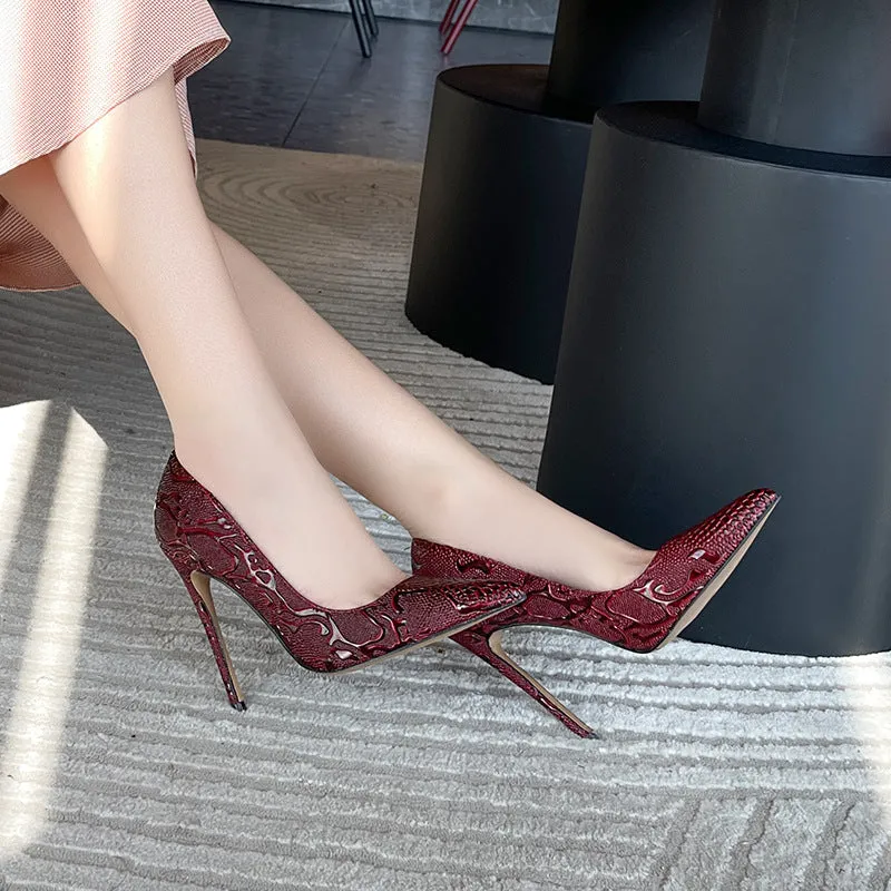 Sure! Heres an optimized title for the product:

Elegant Womens Embossed Pointed Toe Stiletto Heel Pumps - Chic and Stylish Footwear for Any Occasion